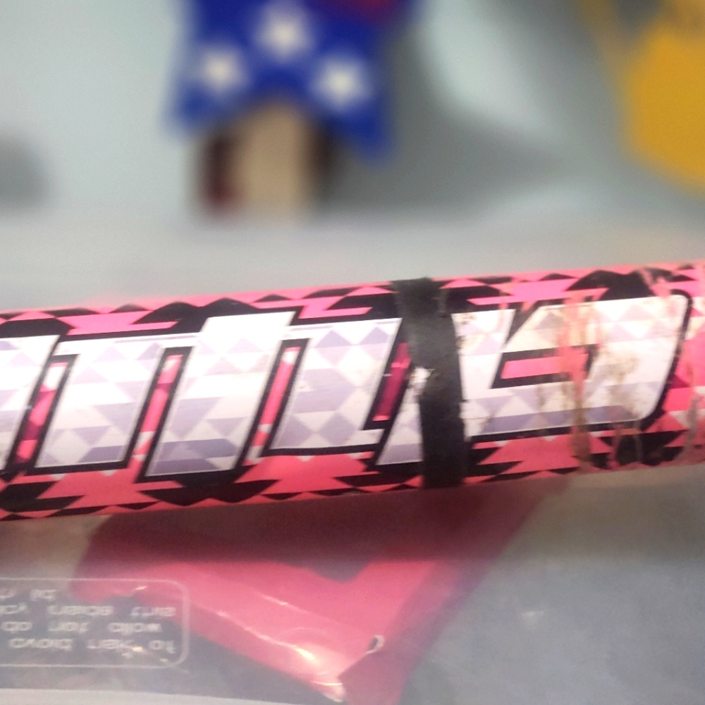 Pink rawlings softball bat.  It hasn't been wiped down since it was put away